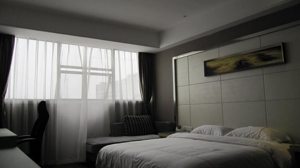 Sheng Jing Yi Jia Hotel Huji ภายนอก รูปภาพ